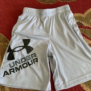Under Armour boys athletic shorts. Gray with black lettering.